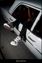 Load image into Gallery viewer, PowStar Jumbo Strap Checker — Paris campaign on-foot photo